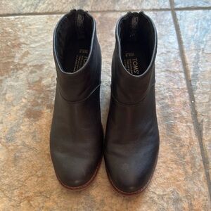 Black Tom’s ankle boots